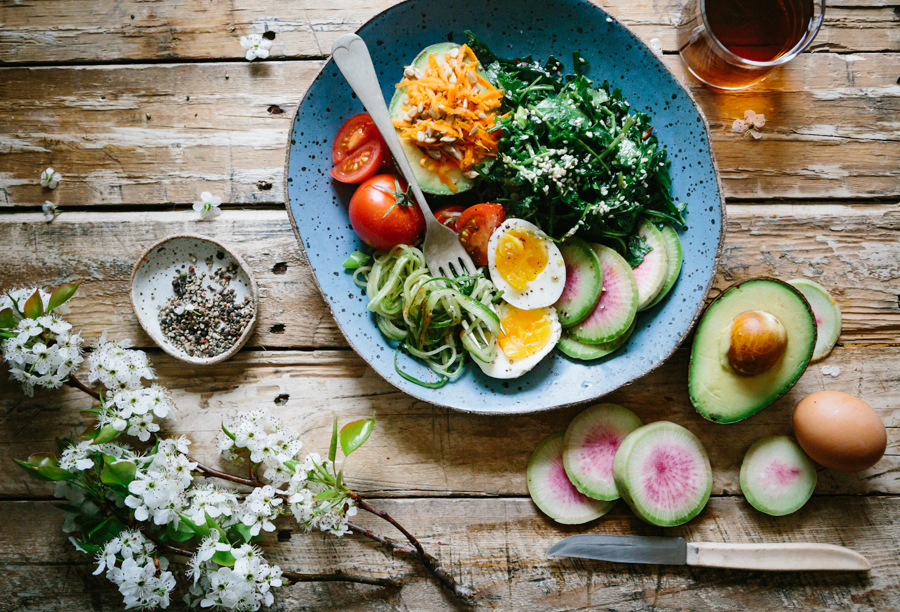 Person enjoying a balanced, colourful meal